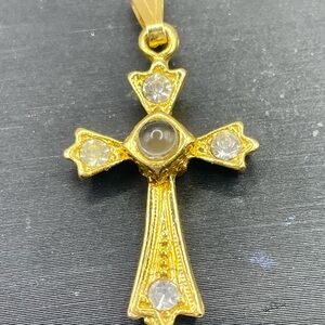 Gold Tone Cross Pendant with Clear Bead Center and Rhinestone Accents